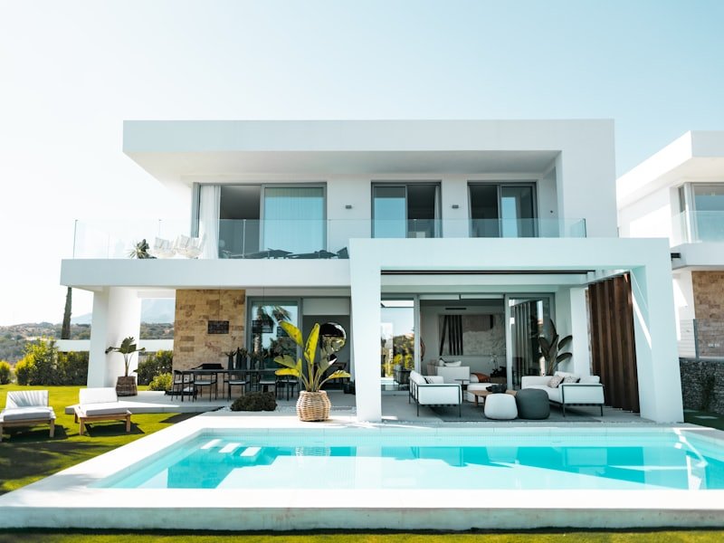 Contemporary white residential building with terraces